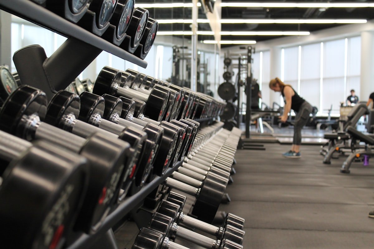 Large wall mirrors in a well-equipped home gym
