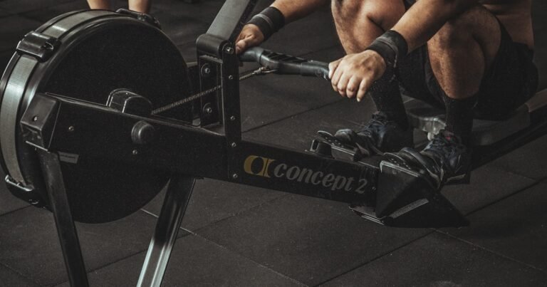 Concept2 rowing machine in a home garage gym setting